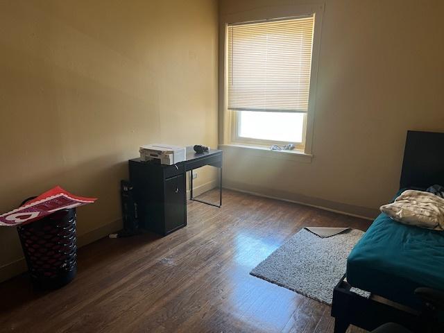 1428 S St Louis Ave, Chicago, IL 60623 - bedroom featuring wood finished floors and baseboards