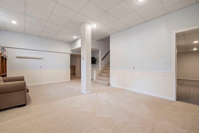 403 Tonelli Trl, Lockport, IL 60441 - finished below grade area with carpet flooring, wainscoting, stairway, and a paneled ceiling