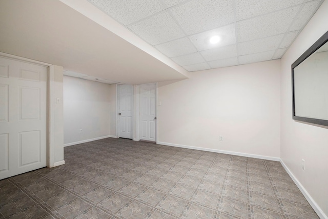 403 Tonelli Trl, Lockport, IL 60441 - spare room featuring baseboards and a paneled ceiling