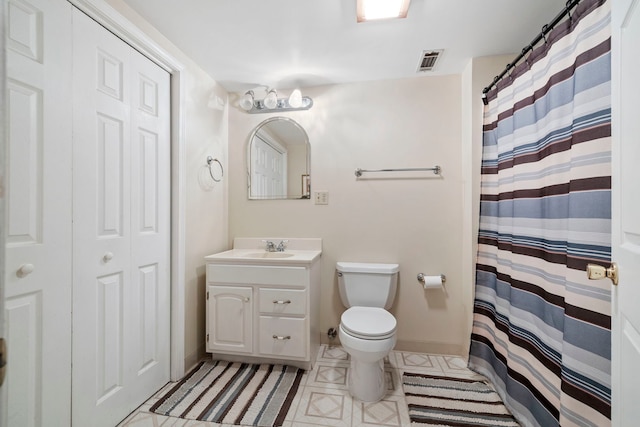 403 Tonelli Trl, Lockport, IL 60441 - bathroom with toilet, vanity, tile patterned floors, and baseboards
