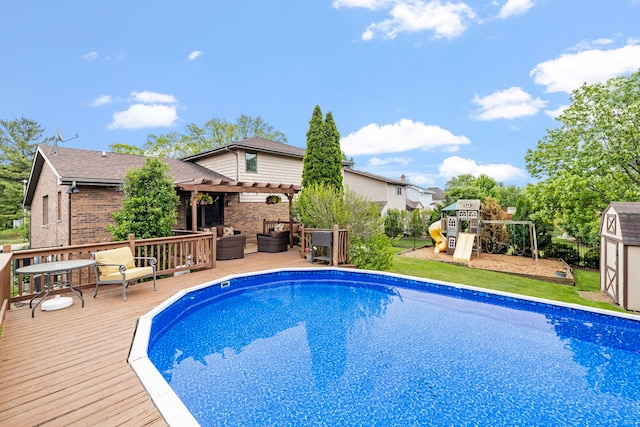 403 Tonelli Trl, Lockport, IL 60441 - outdoor pool featuring a pergola, a deck, and a playground