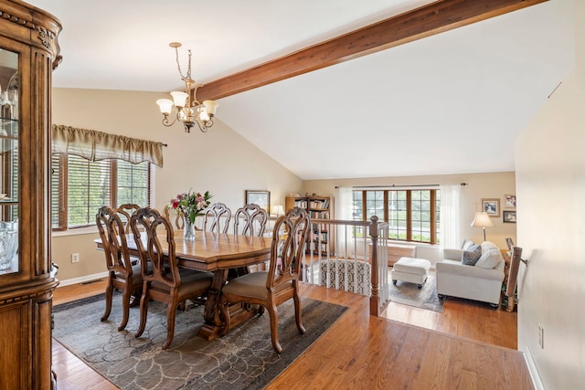403 Tonelli Trl, Lockport, IL 60441 - dining space with wood finished floors, a chandelier, and baseboards