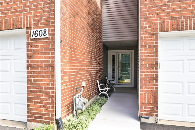 1608 W Ethans Glen Dr, Palatine, IL 60067 - doorway to property featuring brick siding and a garage