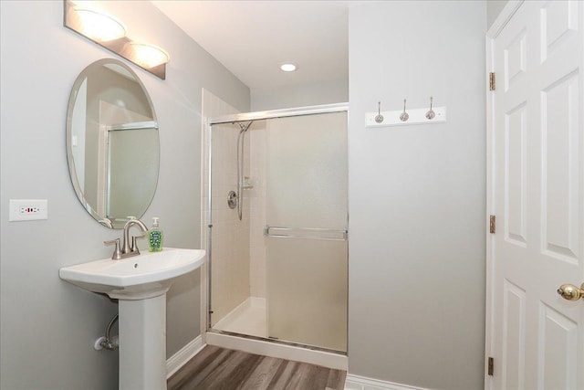 1608 W Ethans Glen Dr, Palatine, IL 60067 - bathroom featuring a stall shower, baseboards, and wood finished floors