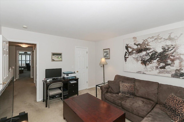 1608 W Ethans Glen Dr, Palatine, IL 60067 - living room with light colored carpet, a desk, and baseboards