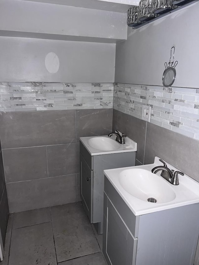 17814 Burnham Ave, Lansing, IL 60438 - bathroom with tile walls, vanity, and tile patterned floors