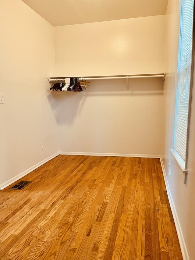 1723 N Richmond St, Chicago, IL 60647 - spacious closet featuring wood finished floors