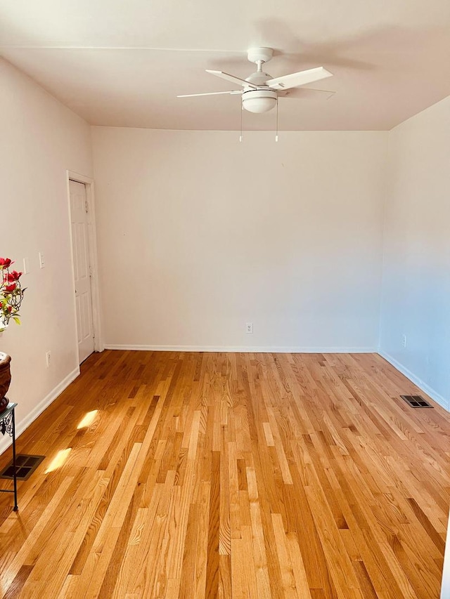 1723 N Richmond St, Chicago, IL 60647 - spare room featuring light wood-style flooring, a ceiling fan, and baseboards