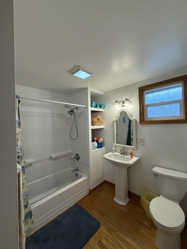 1723 N Richmond St, Chicago, IL 60647 - full bath with toilet, wood finished floors, shower / bath combo with shower curtain, and baseboards
