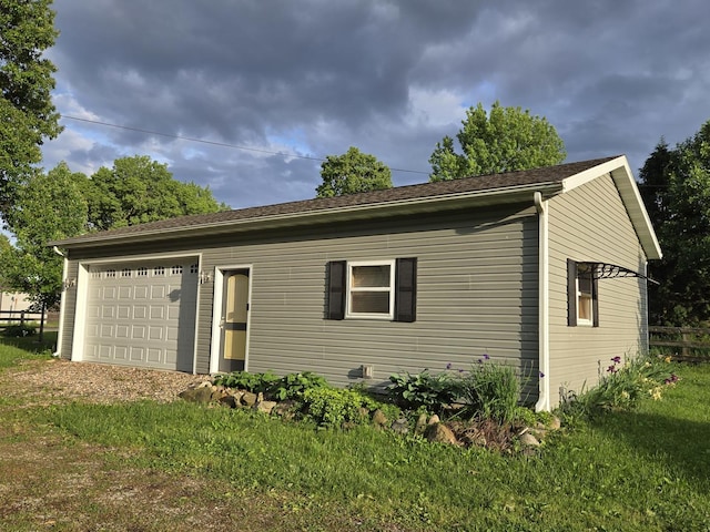 101 4th St, Fisher, IL 61843 - view of front of home featuring a garage