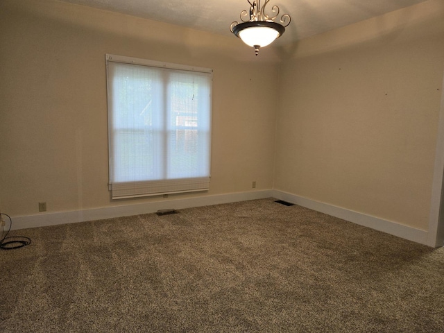 101 4th St, Fisher, IL 61843 - unfurnished room with carpet and baseboards