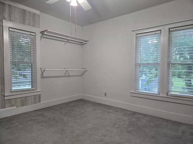101 4th St, Fisher, IL 61843 - carpeted empty room featuring ceiling fan and baseboards