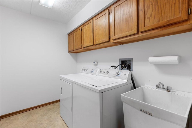 5255 N Riversedge Ter Unit 206, Chicago, IL 60630 - laundry area with light carpet, separate washer and dryer, cabinet space, and baseboards