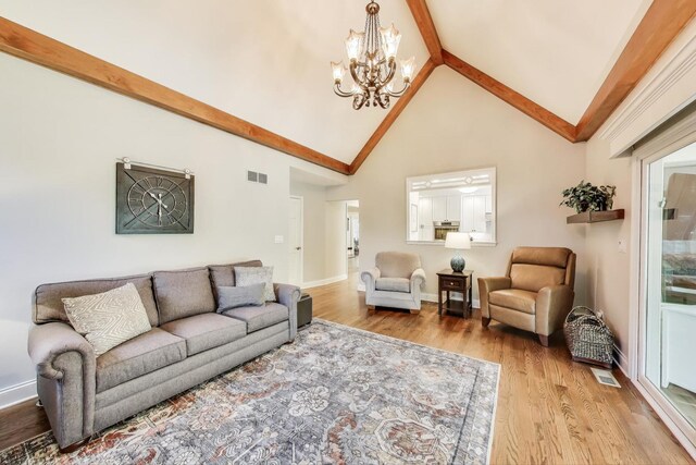 2041 Chatham Dr, Wheaton, IL 60189 - living room with a chandelier, wood finished floors, high vaulted ceiling, baseboards, and beamed ceiling