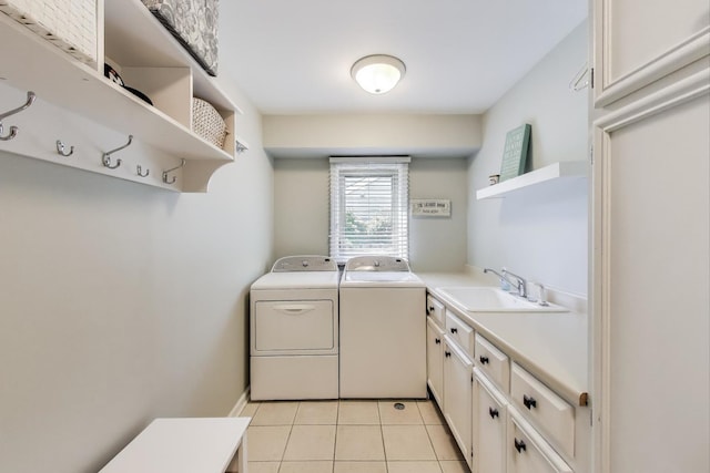 2041 Chatham Dr, Wheaton, IL 60189 - clothes washing area featuring washing machine and clothes dryer, light tile patterned flooring, and cabinet space