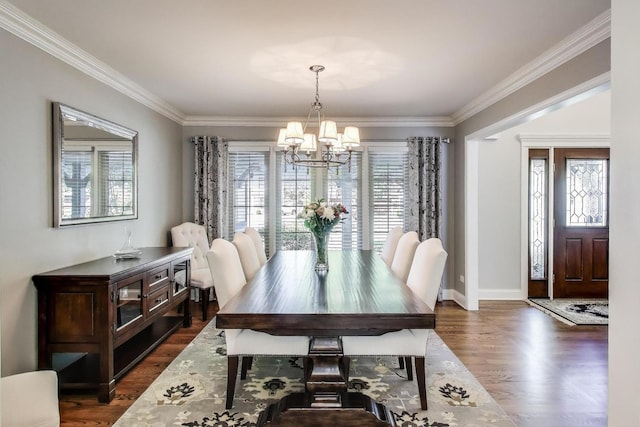2041 Chatham Dr, Wheaton, IL 60189 - dining space with a chandelier, crown molding, dark wood finished floors, and baseboards