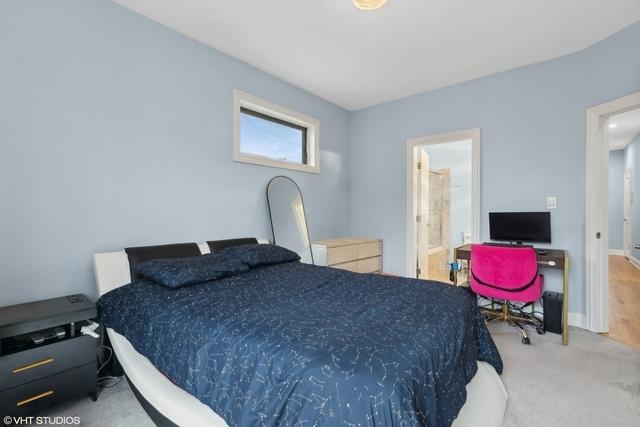 3934 W Argyle St Unit 3, Chicago, IL 60625 - bedroom featuring carpet floors and ensuite bathroom