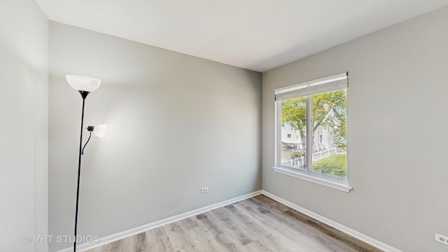 2135 Schumacher Dr, Naperville, IL 60540 - unfurnished room with light wood-type flooring and baseboards