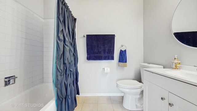 2135 Schumacher Dr, Naperville, IL 60540 - full bathroom featuring tile patterned flooring, toilet, vanity, baseboards, and shower / bath combo