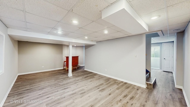 2135 Schumacher Dr, Naperville, IL 60540 - below grade area with wood finished floors, a paneled ceiling, baseboards, recessed lighting, and a bar