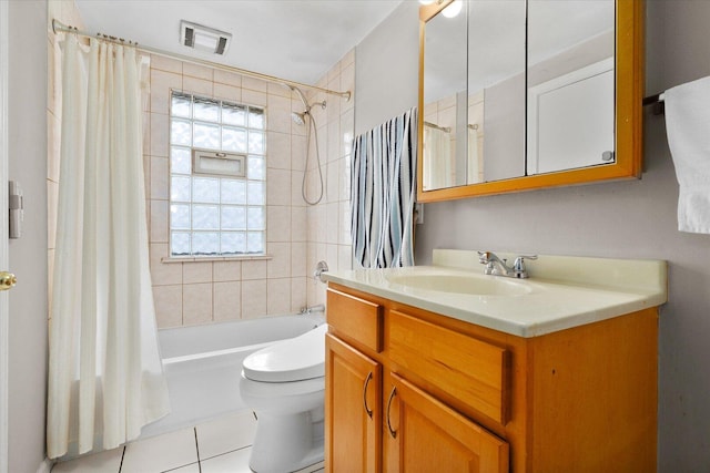 bathroom featuring tile patterned floors, shower / bath combination with curtain, toilet, and vanity