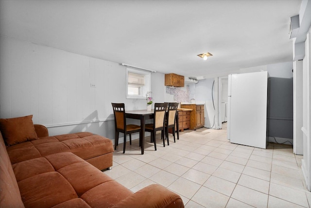 living room with light tile patterned floors
