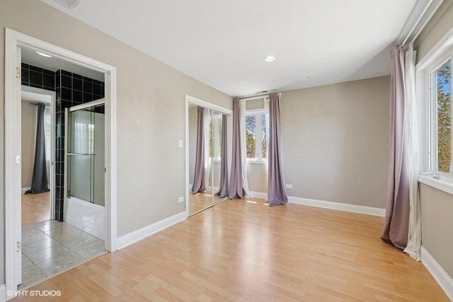 36 Chestnut Rd, Northbrook, IL 60062 - spare room featuring light wood-type flooring, baseboards, and recessed lighting