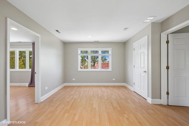 36 Chestnut Rd, Northbrook, IL 60062 - empty room with light wood-style floors, baseboards, and recessed lighting