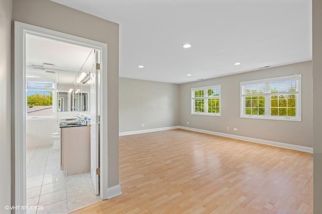 36 Chestnut Rd, Northbrook, IL 60062 - unfurnished room with baseboards, light wood-style flooring, and recessed lighting