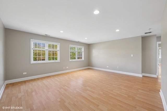 36 Chestnut Rd, Northbrook, IL 60062 - unfurnished room with light wood finished floors, baseboards, and recessed lighting