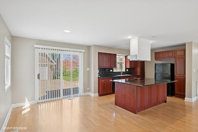 36 Chestnut Rd, Northbrook, IL 60062 - kitchen with freestanding refrigerator, dark countertops, light wood-style flooring, baseboards, and recessed lighting