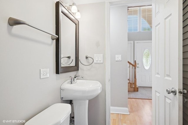 36 Chestnut Rd, Northbrook, IL 60062 - bathroom with healthy amount of natural light, wood finished floors, toilet, and baseboards