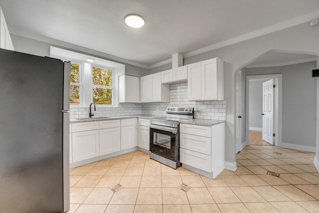 7133 W 16th St, Berwyn, IL 60402 - kitchen with stainless steel appliances, a sink, backsplash, light tile patterned floors, and ornamental molding
