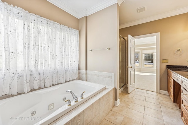 9310 Nicklaus Ln, Lakewood, IL 60014 - bathroom featuring vanity, a jetted tub, a stall shower, tile patterned flooring, and ornamental molding