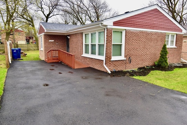 2837 18th St, North Chicago, IL 60064 - view of side of property featuring brick siding and fence