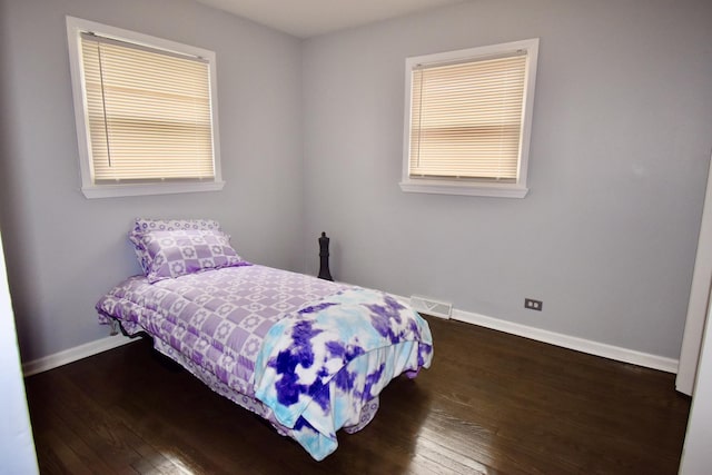 2837 18th St, North Chicago, IL 60064 - bedroom featuring baseboards and wood finished floors