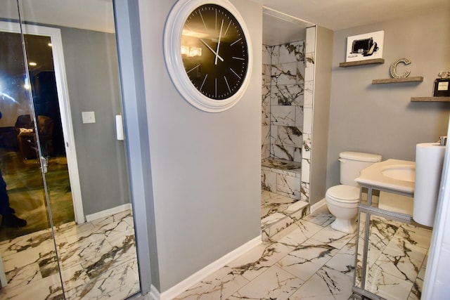 2837 18th St, North Chicago, IL 60064 - full bath featuring marble finish floors, a marble finish shower, toilet, and baseboards
