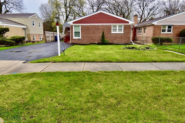 2837 18th St, North Chicago, IL 60064 - view of side of home with brick siding and asphalt driveway
