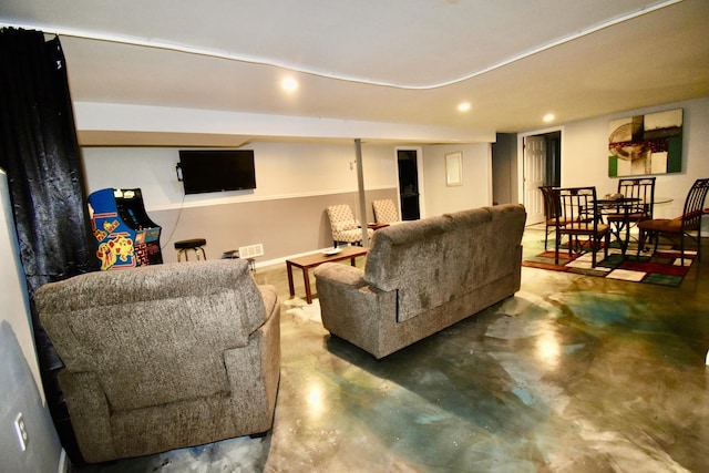2837 18th St, North Chicago, IL 60064 - living room featuring recessed lighting, finished concrete flooring, and baseboards