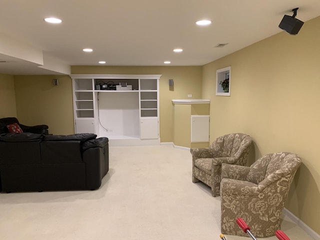 carpeted living room featuring recessed lighting and baseboards