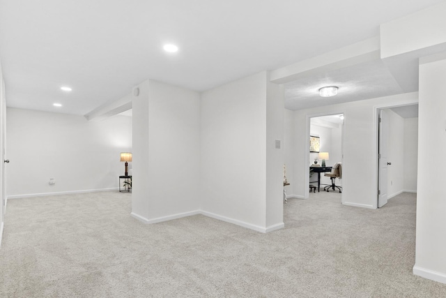 104 S Taylor St, Towanda, IL 61776 - empty room featuring carpet flooring, baseboards, a desk, and recessed lighting