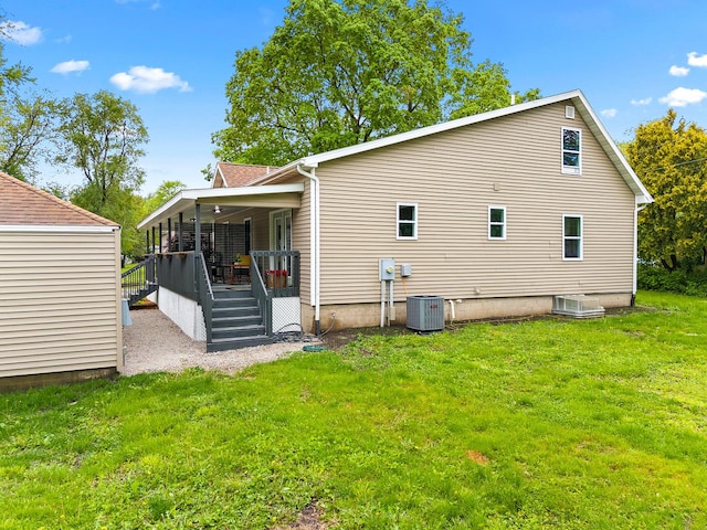 104 S Taylor St, Towanda, IL 61776 - back of property featuring a lawn