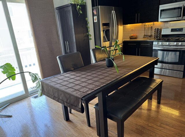 2406 Daybreak Ct, Elgin, IL 60123 - dining space with wood finished floors