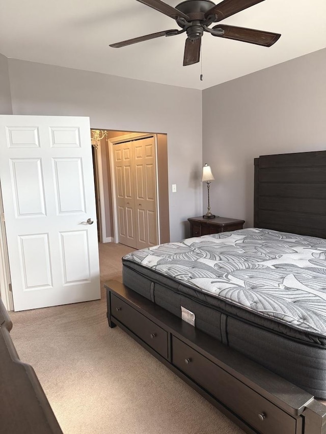 140 S River St Unit 208, Aurora, IL 60506 - bedroom featuring carpet, a closet, and ceiling fan