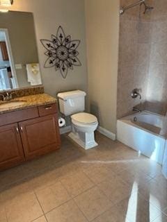 140 S River St Unit 208, Aurora, IL 60506 - full bath with tile patterned flooring, shower / bath combination, toilet, and vanity