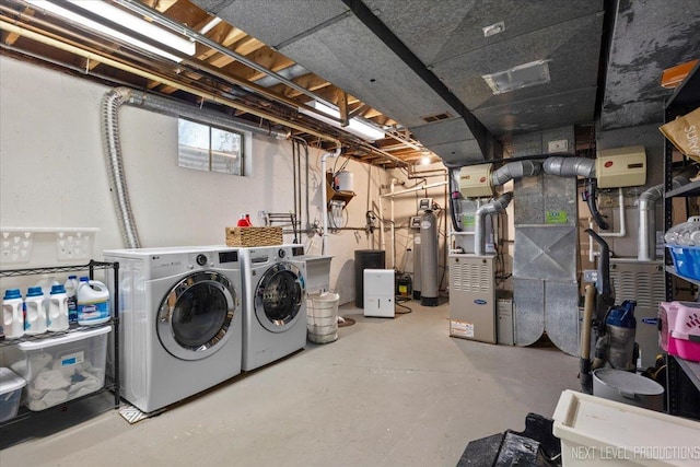 below grade area featuring washer and dryer