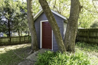 view of shed with a fenced backyard