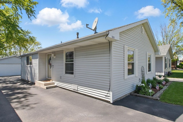 16810 Highview Ave, Orland Hills, IL 60487 - view of side of home featuring an outdoor structure and a garage