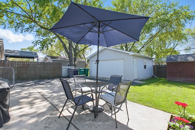 16810 Highview Ave, Orland Hills, IL 60487 - view of patio featuring an outdoor structure, a garage, and outdoor dining space