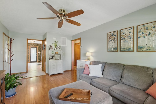 16810 Highview Ave, Orland Hills, IL 60487 - living area with a ceiling fan, light wood finished floors, and baseboards